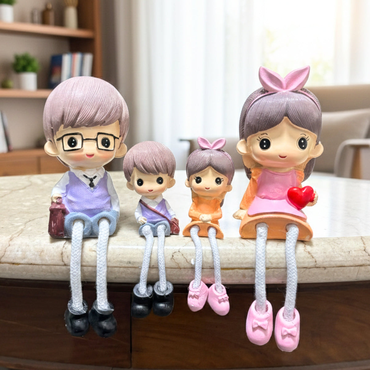 Family of 4 hanging leg figurine set