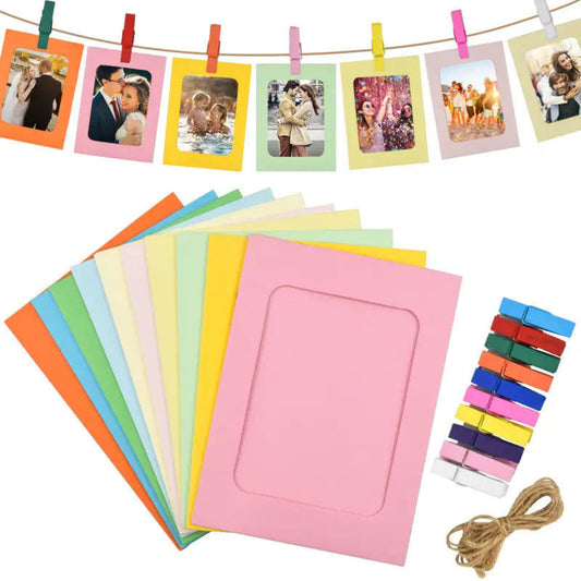 Colorful paper photo frames stacked next to a bundle of clips and string, with an example hanging display above.