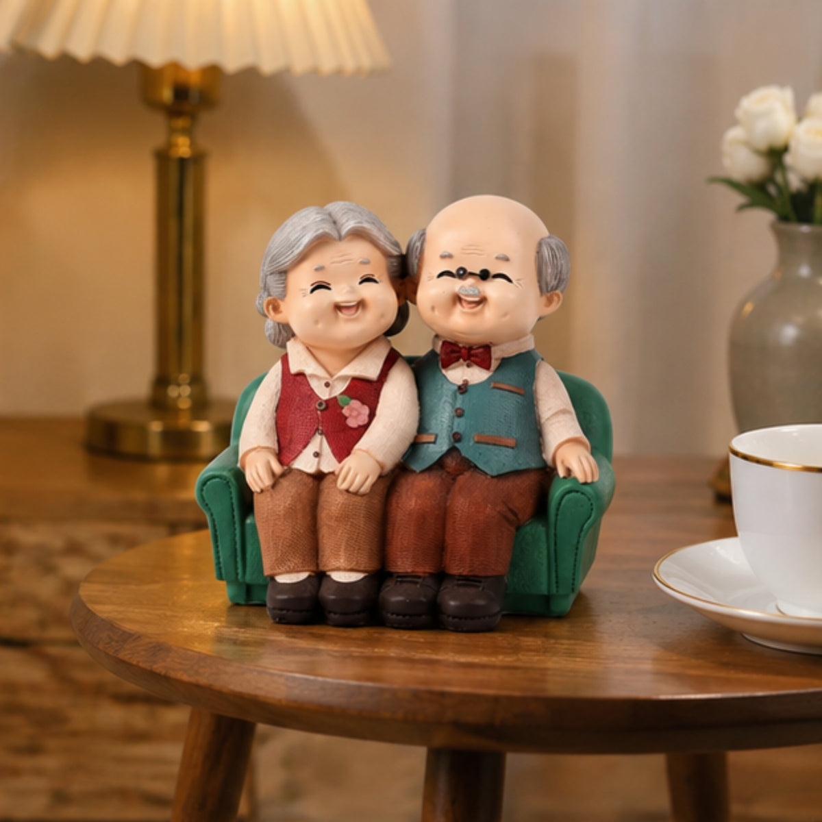 Elderly Couple Figurine - Green Sofa