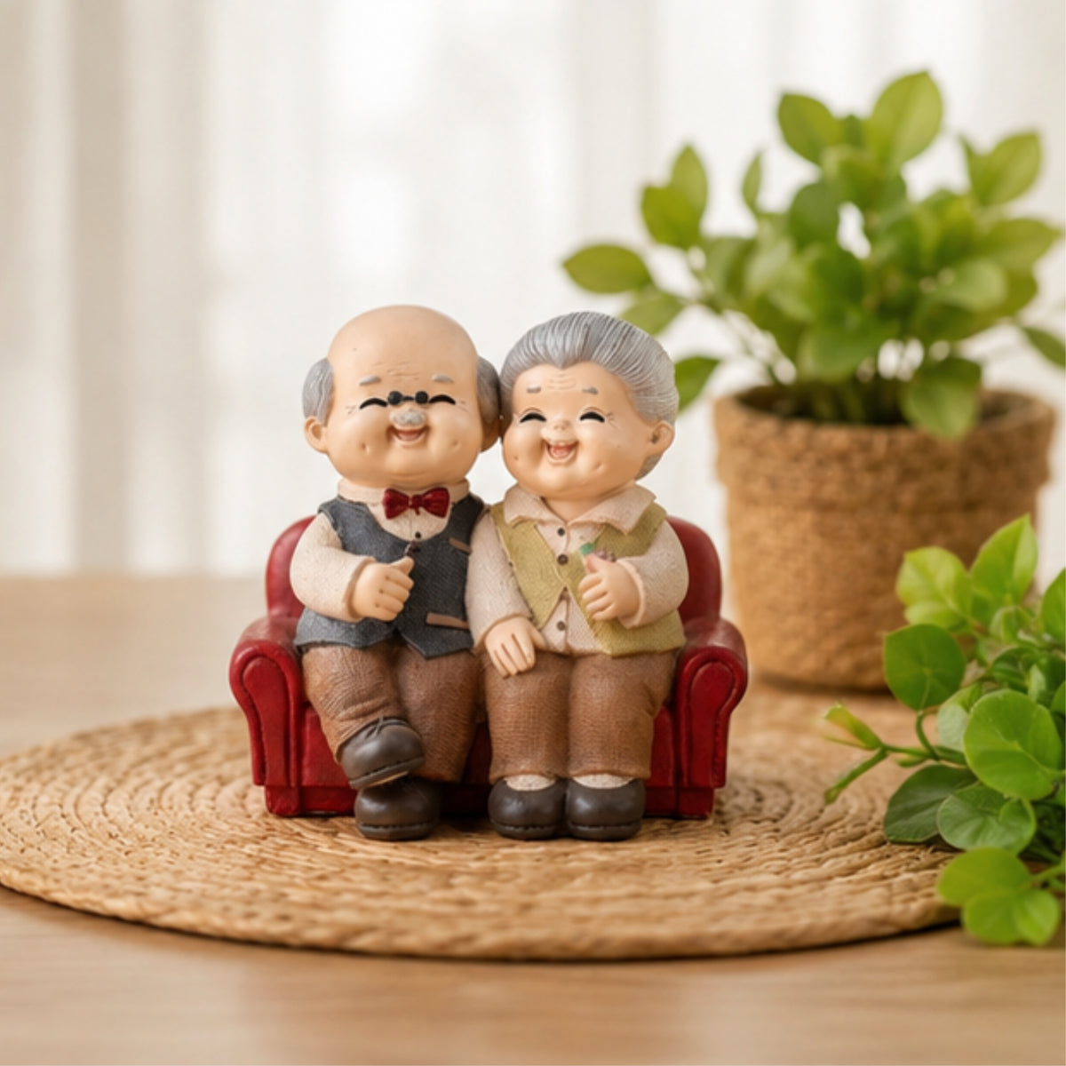 Elderly Couple Figurine - Red Sofa