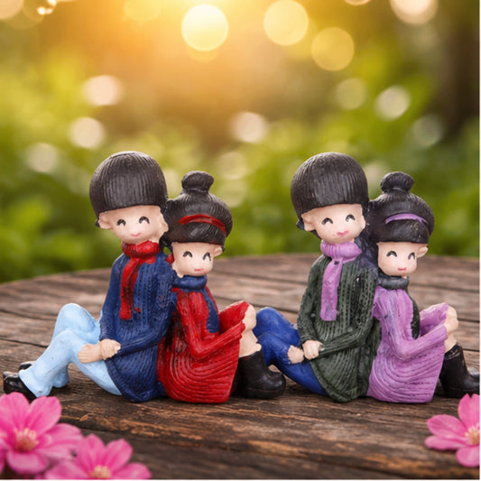 Couple Sitting Back to Back Miniature