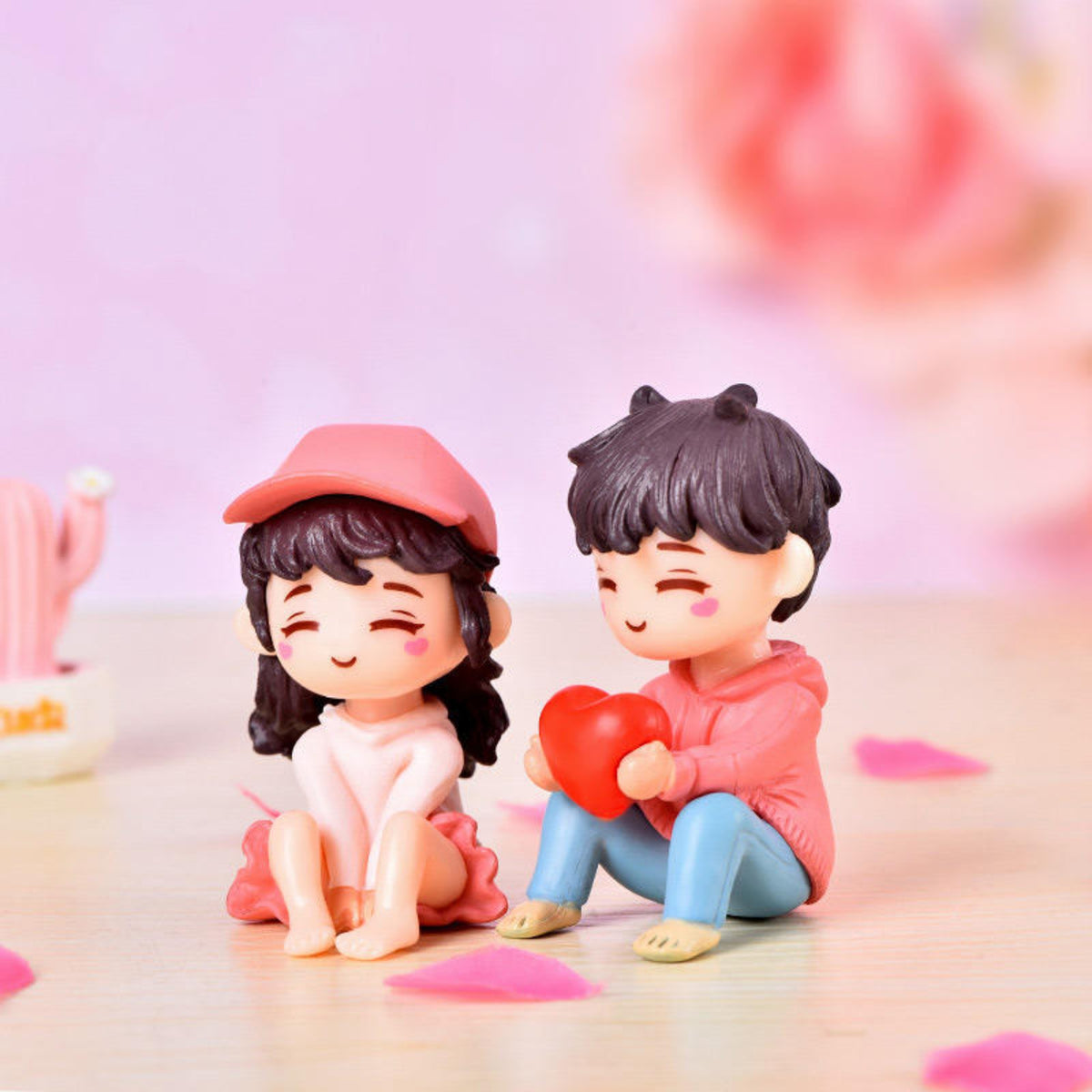 Couple Holding Heart Miniature