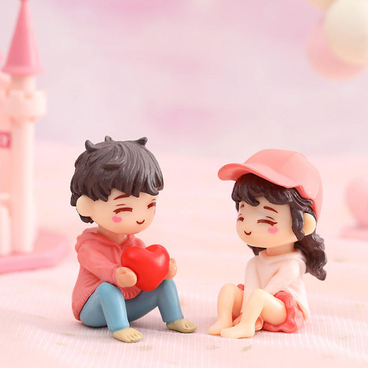 Couple Holding Heart Miniature
