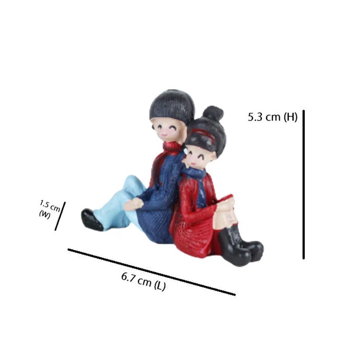 Couple Sitting Back to Back Miniature