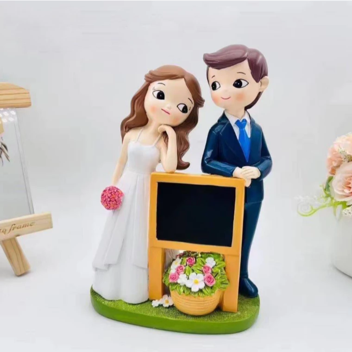 Wedding couple figurine with mini blackboard