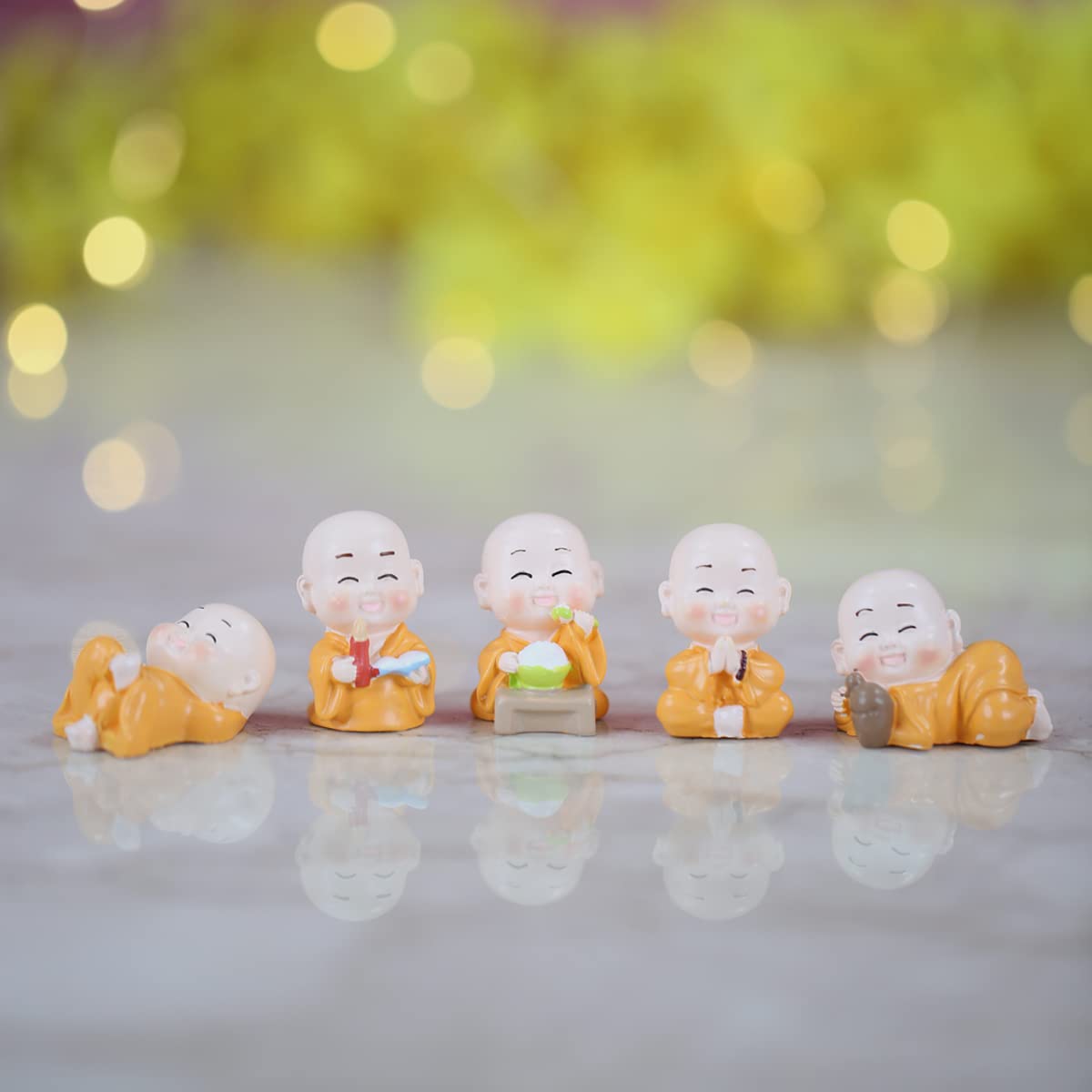 Smiling monk figurines pack of 5